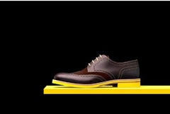 black shirt and brown shoes