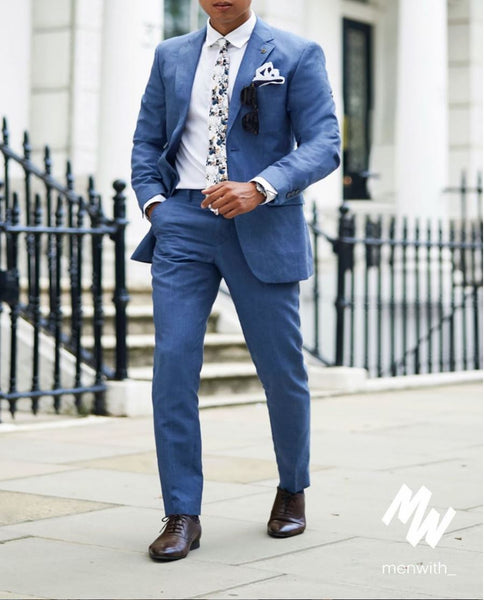 white sneakers with blue suit