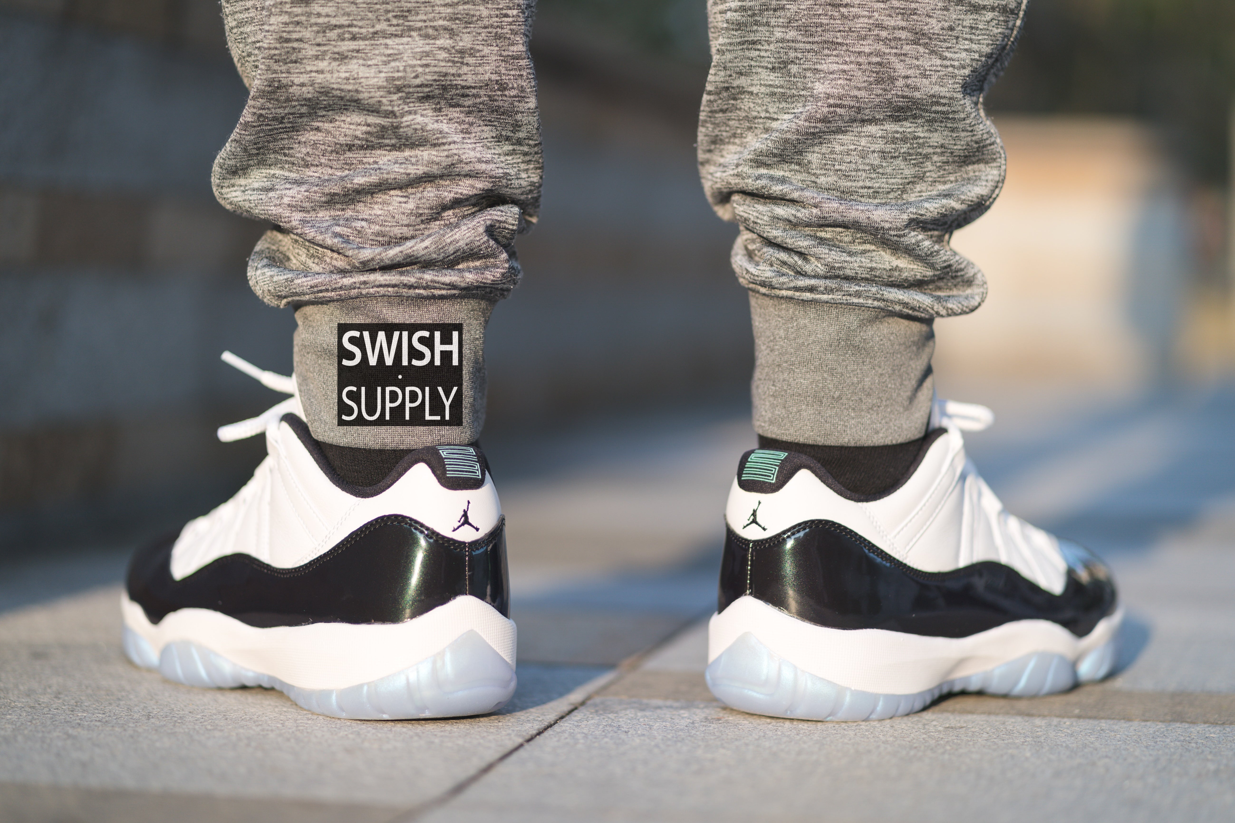 jordan 11 low emerald on feet