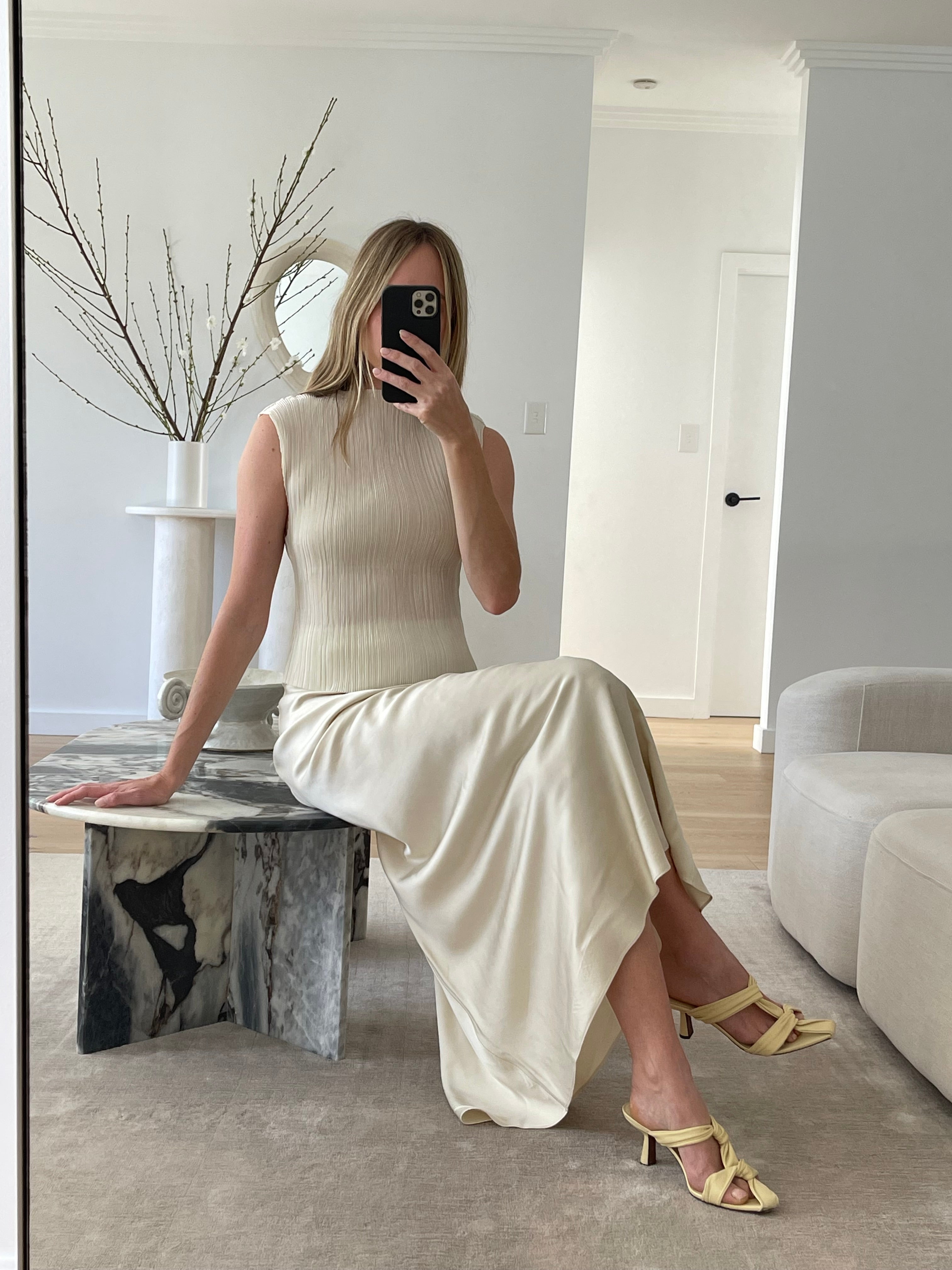 cream pleated top and cream satin midi skirt