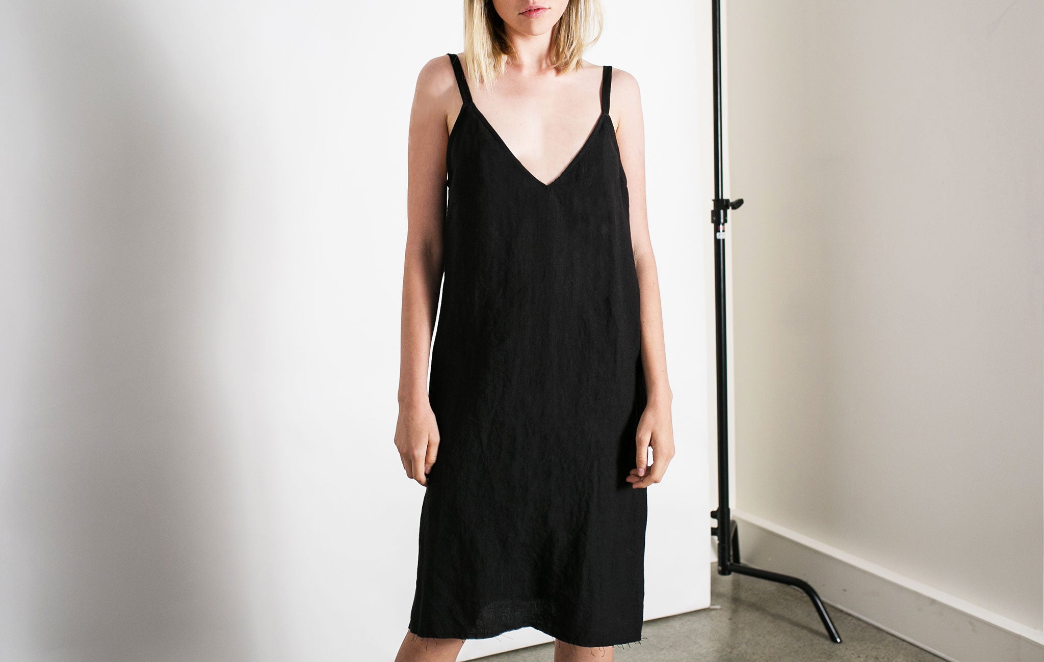 Matin V neck linen dress in black from The UNDONE 