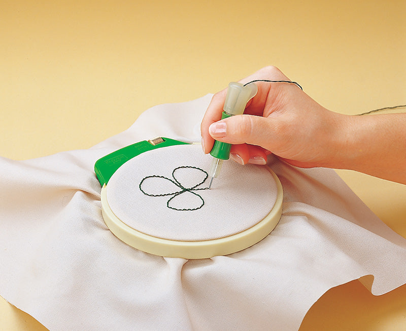 clover embroidery stitching tool in use
