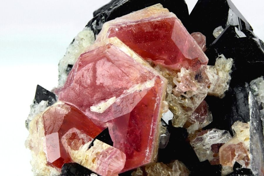 Close up shot of raw pezzottaite.