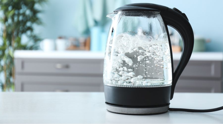 an electric kettle with boiling water