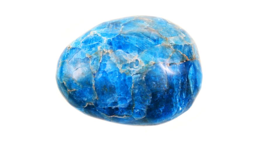 Blue apatite stone isolated on a white background
