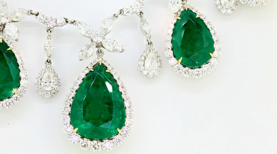 emerald jewelry with diamonds in gold necklace