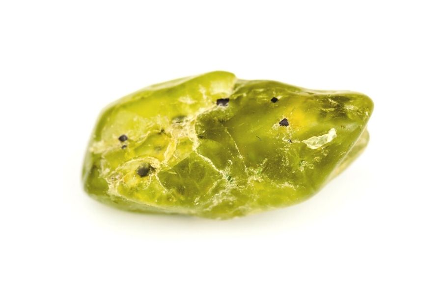 Natural peridot on a white background