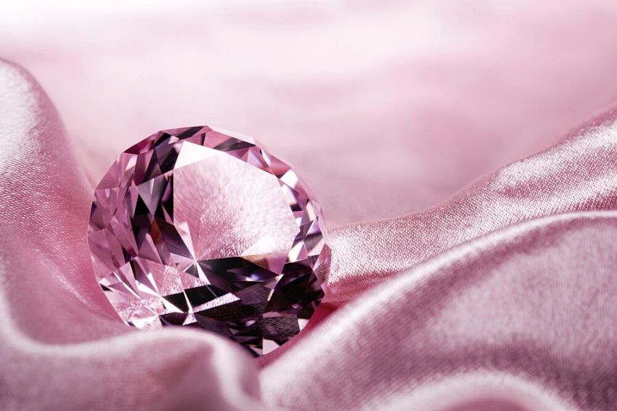 pink gem on a pink satin cloth