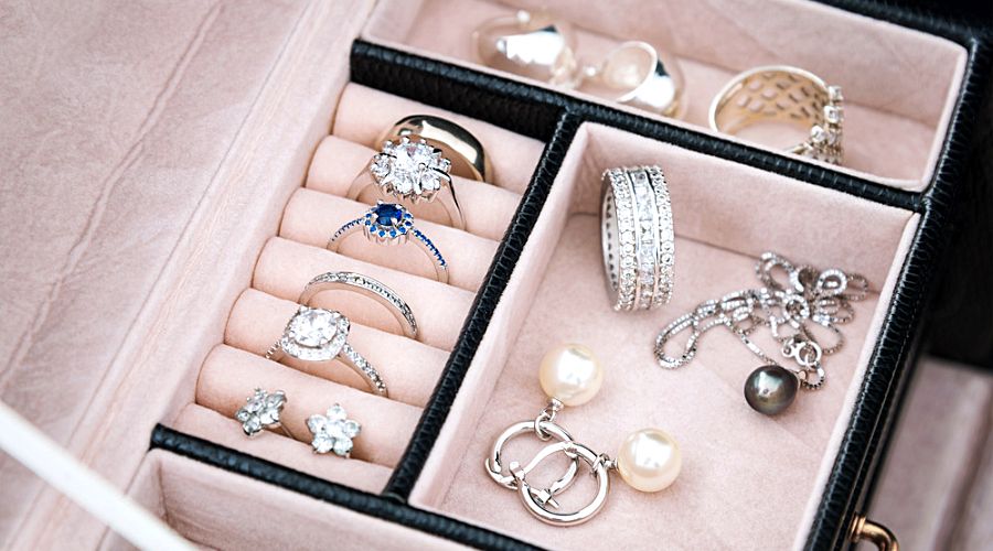 silver jewelry pieces kept nicely in a jewelry box