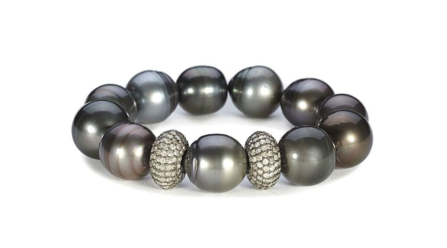 A Tahitian pearl bracelet on a white background