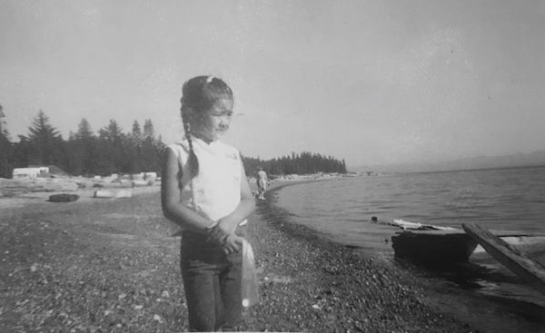 Cydney as 6 year old child on the bank of the Osoyoos Lake