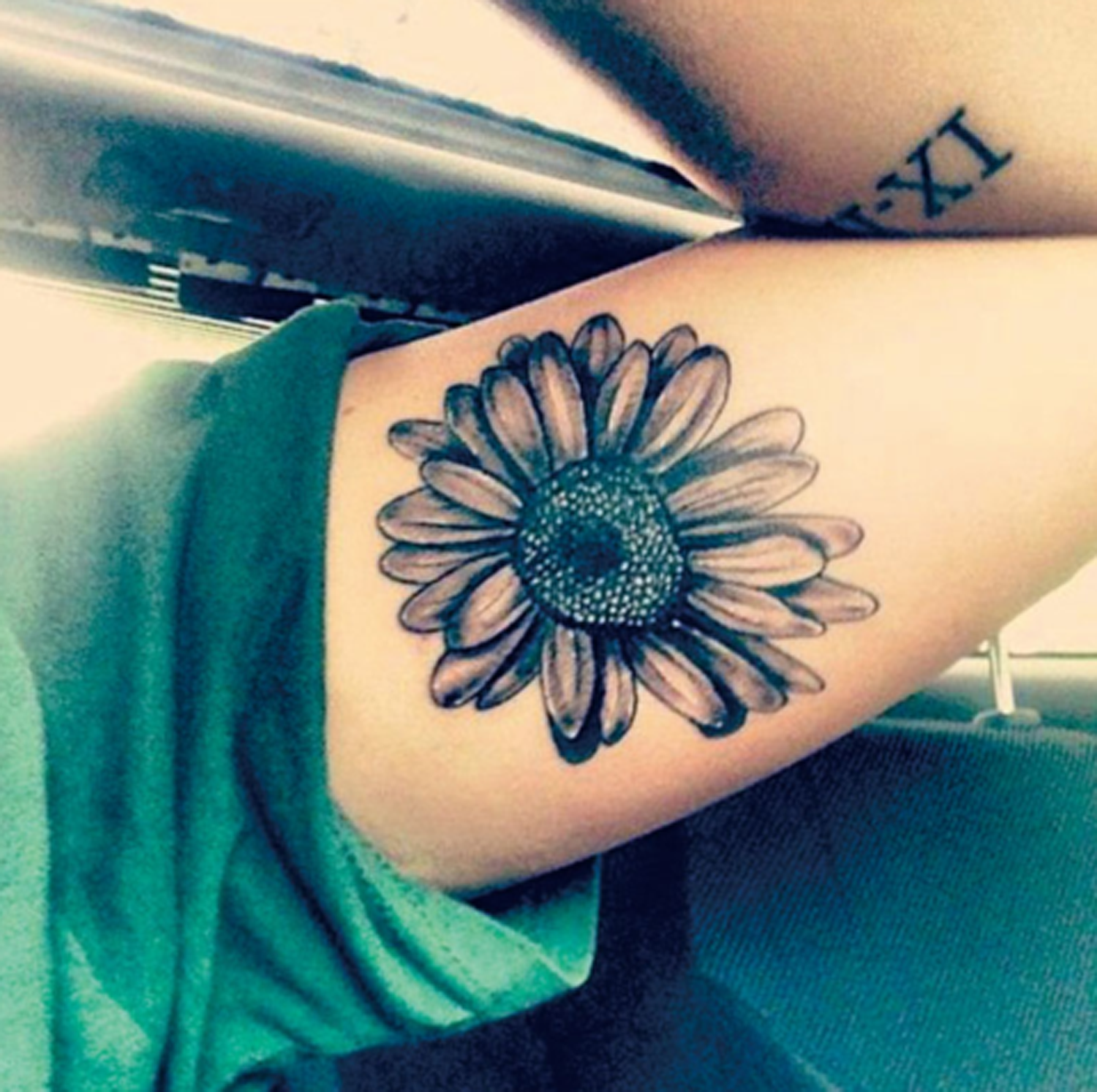 Black and White Sunflower Bicep Arm Tattoo Ideas for Women at MyBodiArt.com