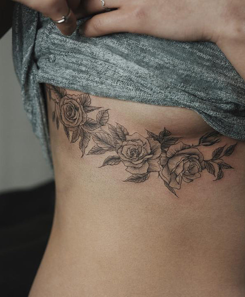 Black Rose Wreath Rib Tattoo Ideas for Women - www.MyBodiArt.com