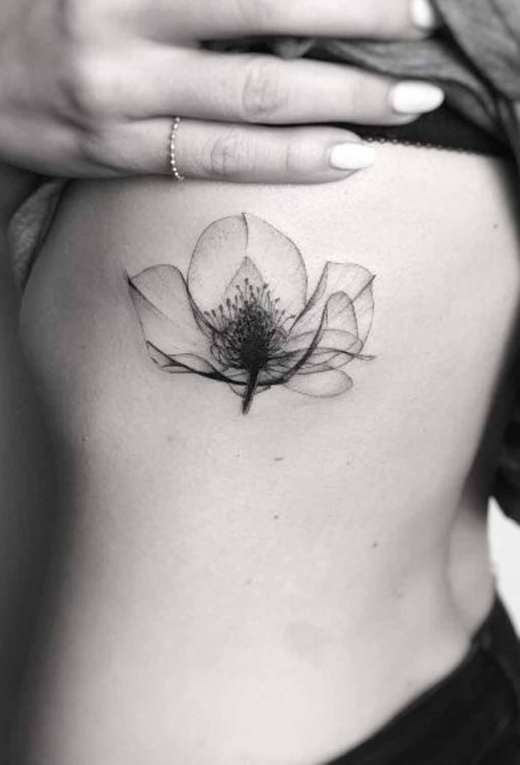 Lotus Rib Tattoo Ideas at MyBodiArt.com - Floral Flower Side Boob Tatt for Women
