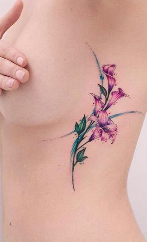 Beautiful Watercolor Purple Floral Flower Lily Tattoo Ideas for Women -  ideas del tatuaje de la costilla de la flor púrpura acuarela para las mujeres - www.MyBodiArt.com