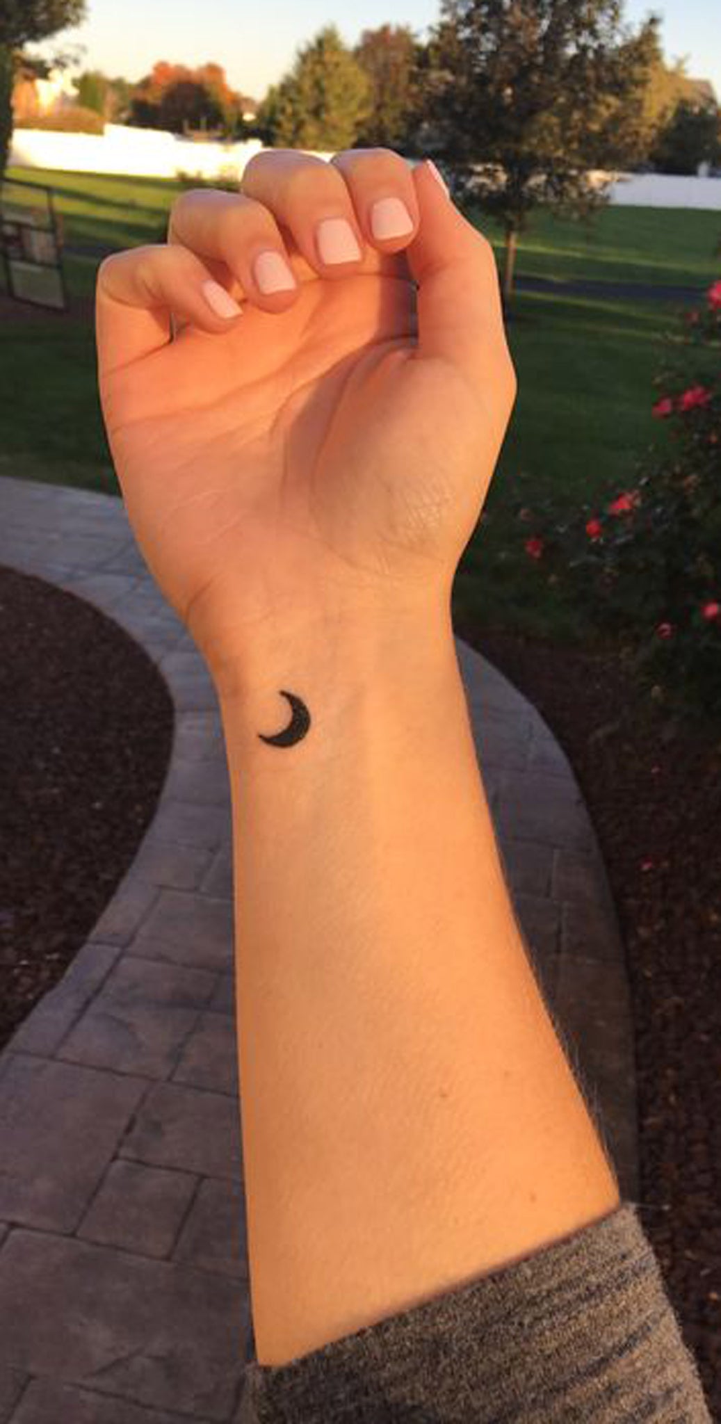 Hand with a Crescent Moon Tattoo  Free Stock Photo