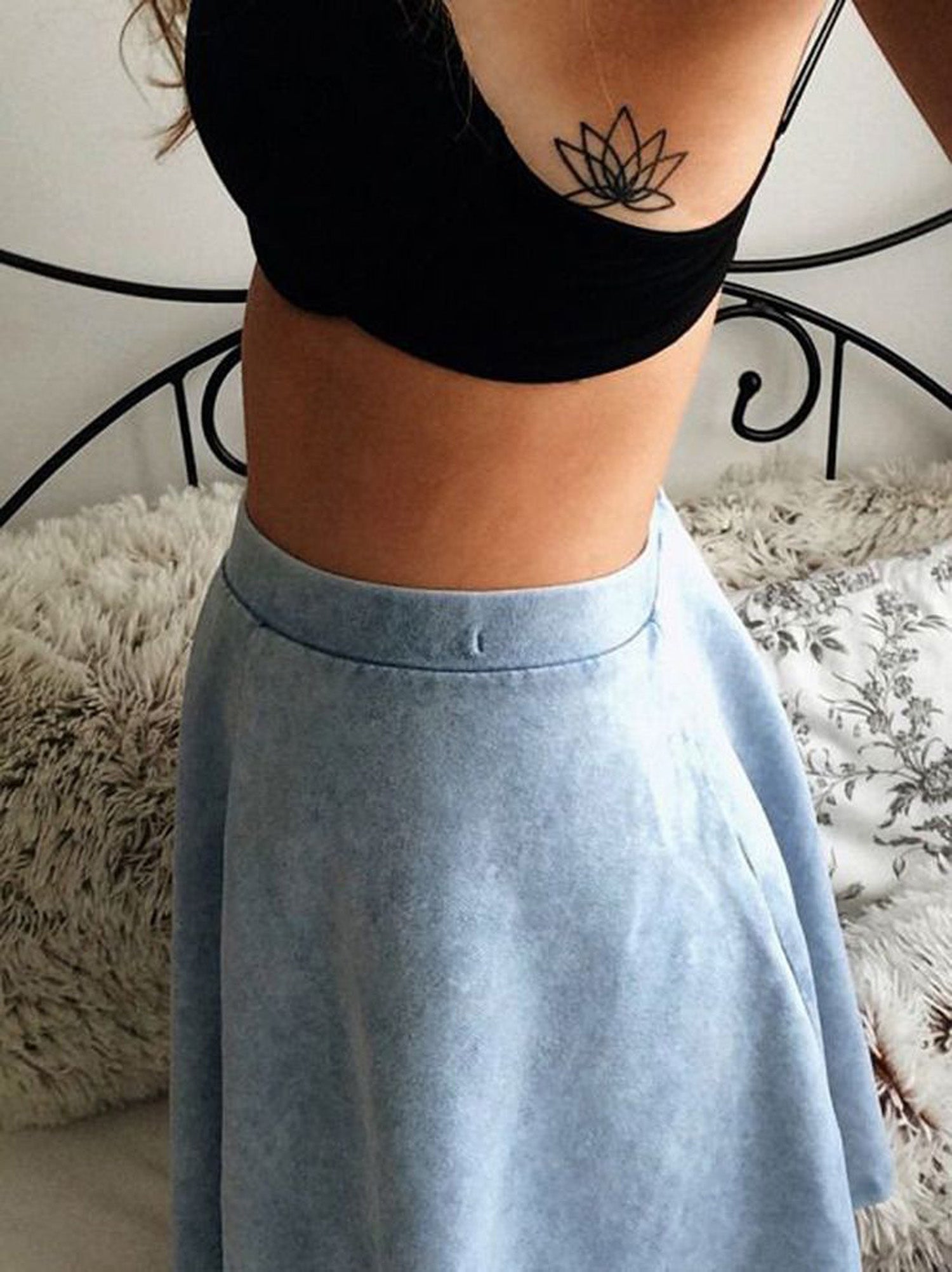 Tribal Small Minimal Lotus Flower Floral Rib Tattoo Ideas for Women at MyBodiArt.com