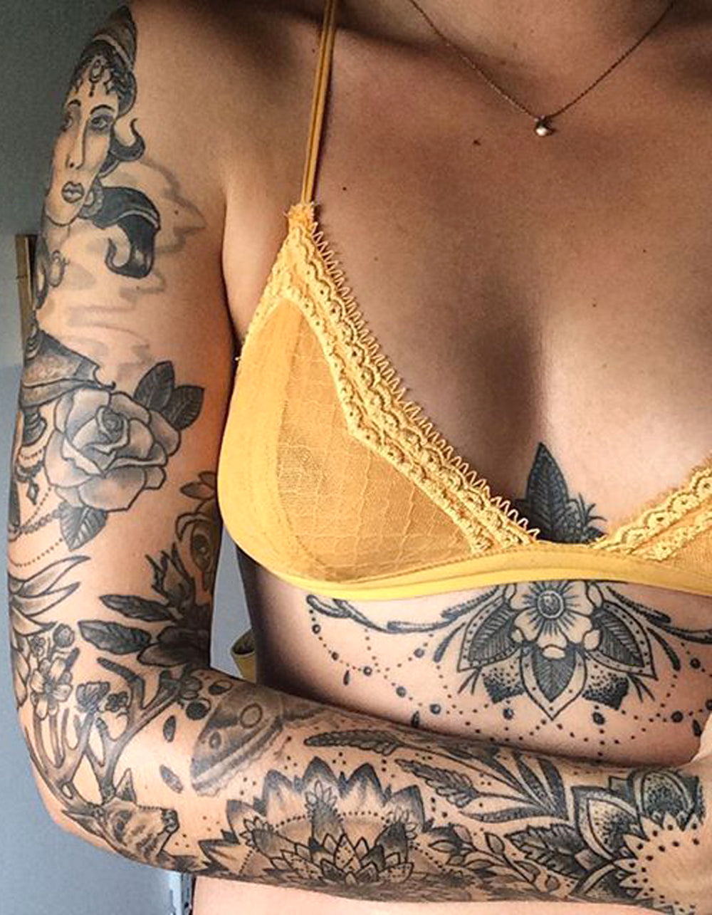 Buddha Arm Sleeve Tattoo Ideas for women - Chandelier Lotus Sternum Tat - www.MyBodiArt.com