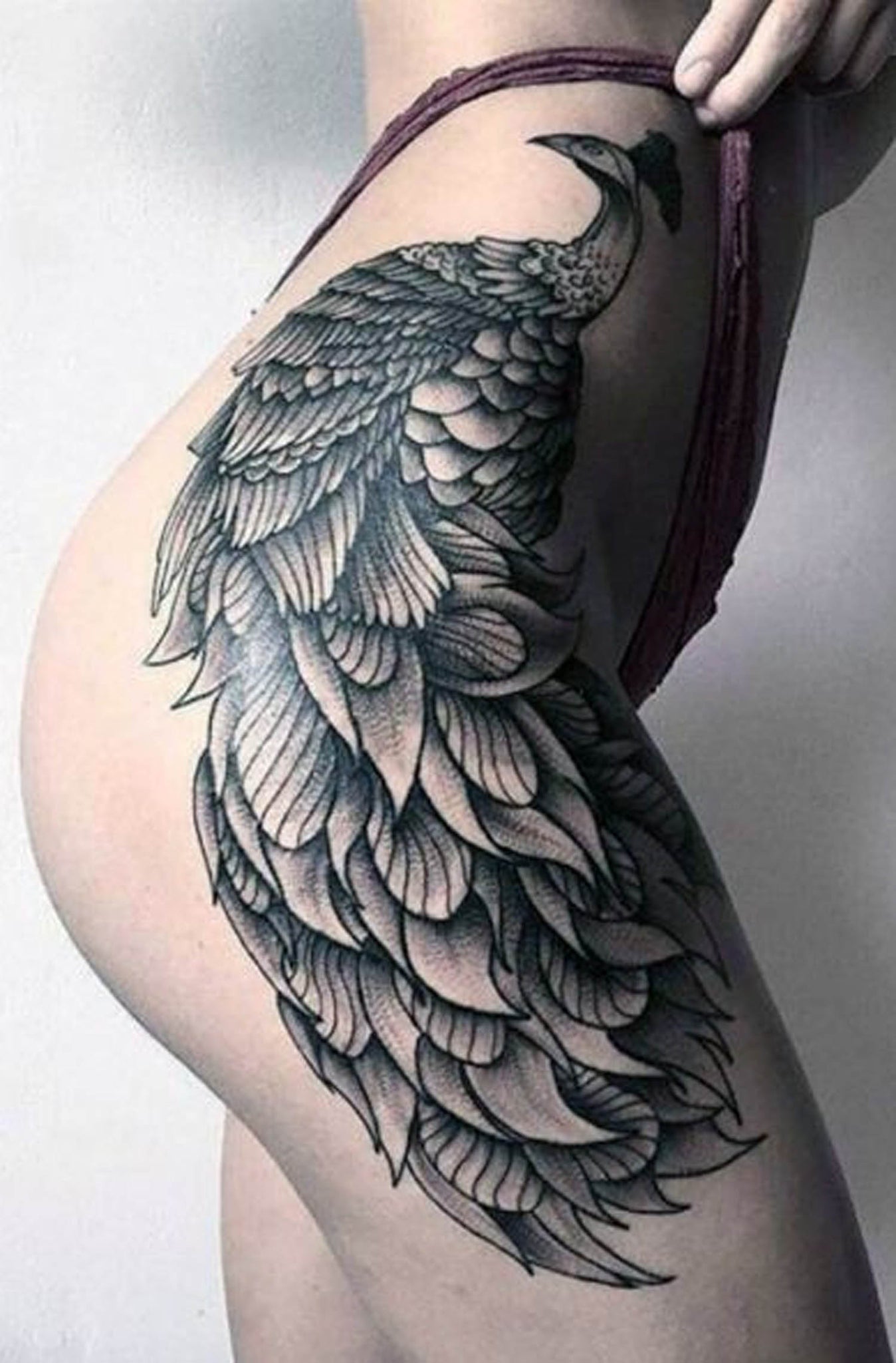 Creative Peacock Thigh Tattoo Ideas -  Unique Bird Hip Tat -  ideas del tatuaje del muslo pavo real - www.MyBodiArt.com