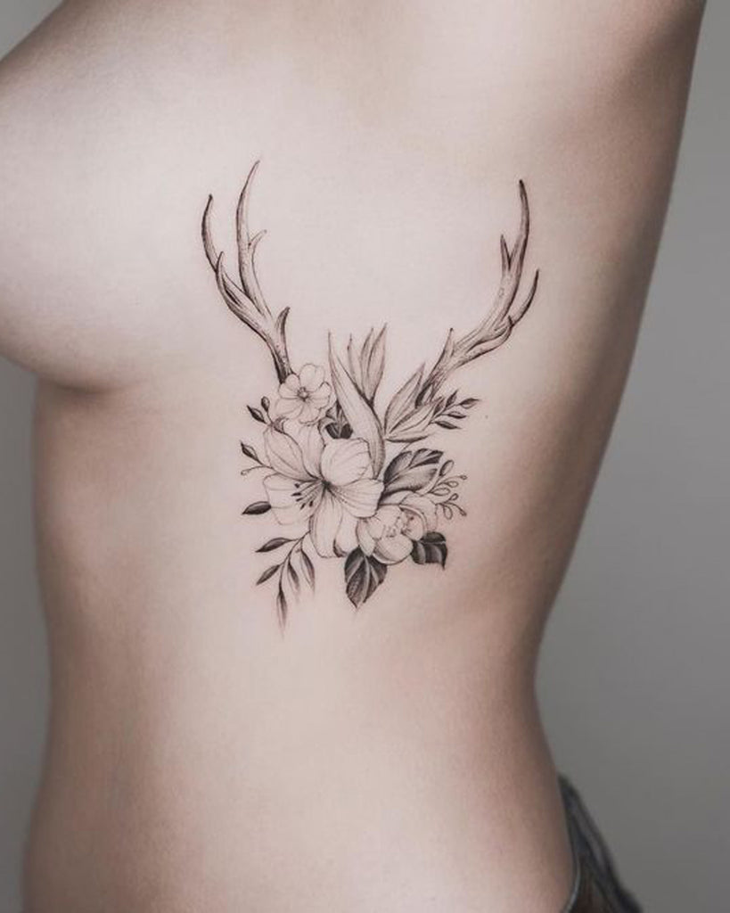 Unique Delicate Reindeer Floral Flower Rib Tattoo Ideas for Women - www.MyBodiArt.com