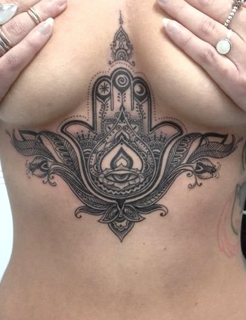 Boho Hamsa Hand Sternum Tattoo Ideas for Women - Lace Chandelier Black Chest Tat - www.MyBodiArt.com