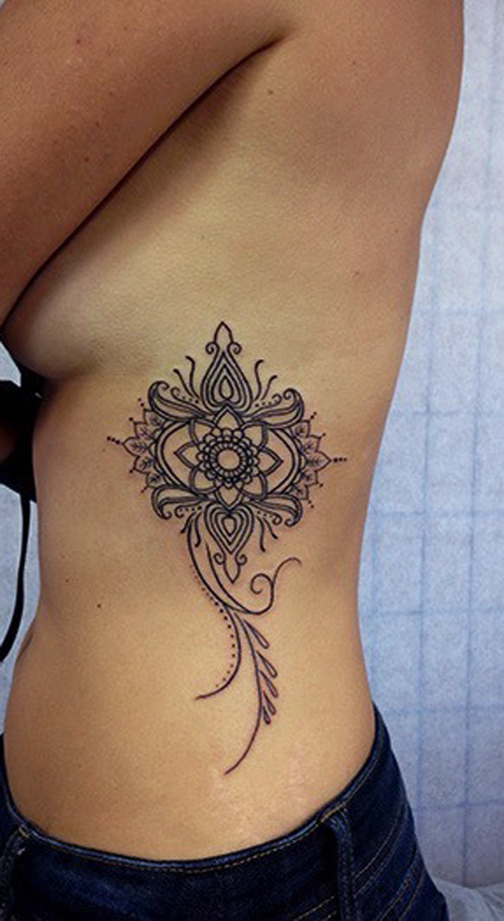 Tribal Mandala Rib Tattoo Ideas for Women - Cute Lotus Side Body Tatt - www.MyBodiArt.com 
