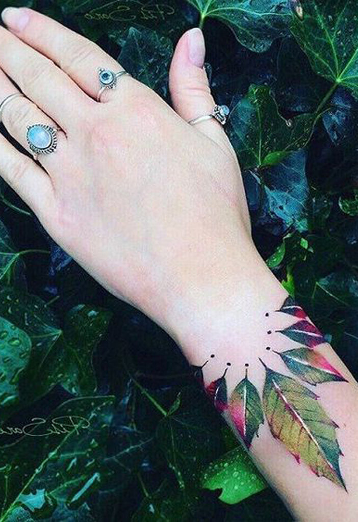 Beautiful Green Watercolor Leaves Wrist Tattoo Ideas for Women - www.MyBodiArt.com