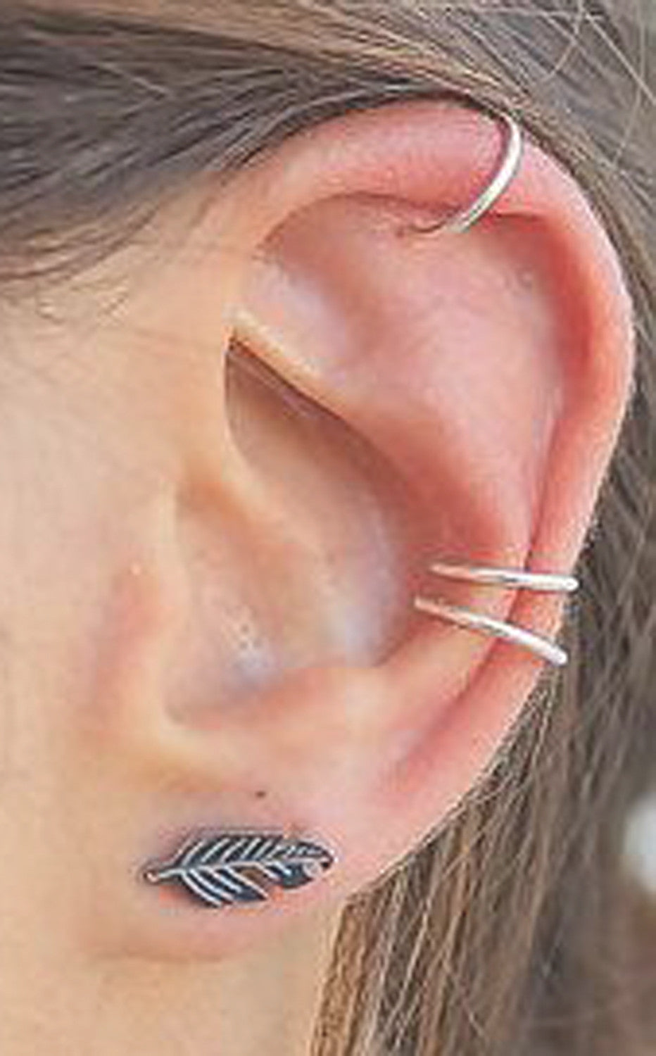 Multiple Minimalist Ear Piercing Ideas at MyBodiArt.com - Cartilage Helix Pinna Hoop Earrings Rings Leaf Leave Studs Silver 