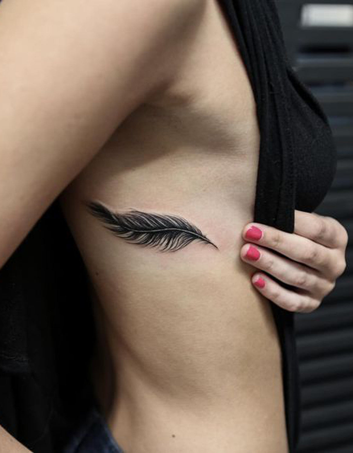 Black Henna Feather Rib Tattoo Ideas for Women at MyBodiArt.com