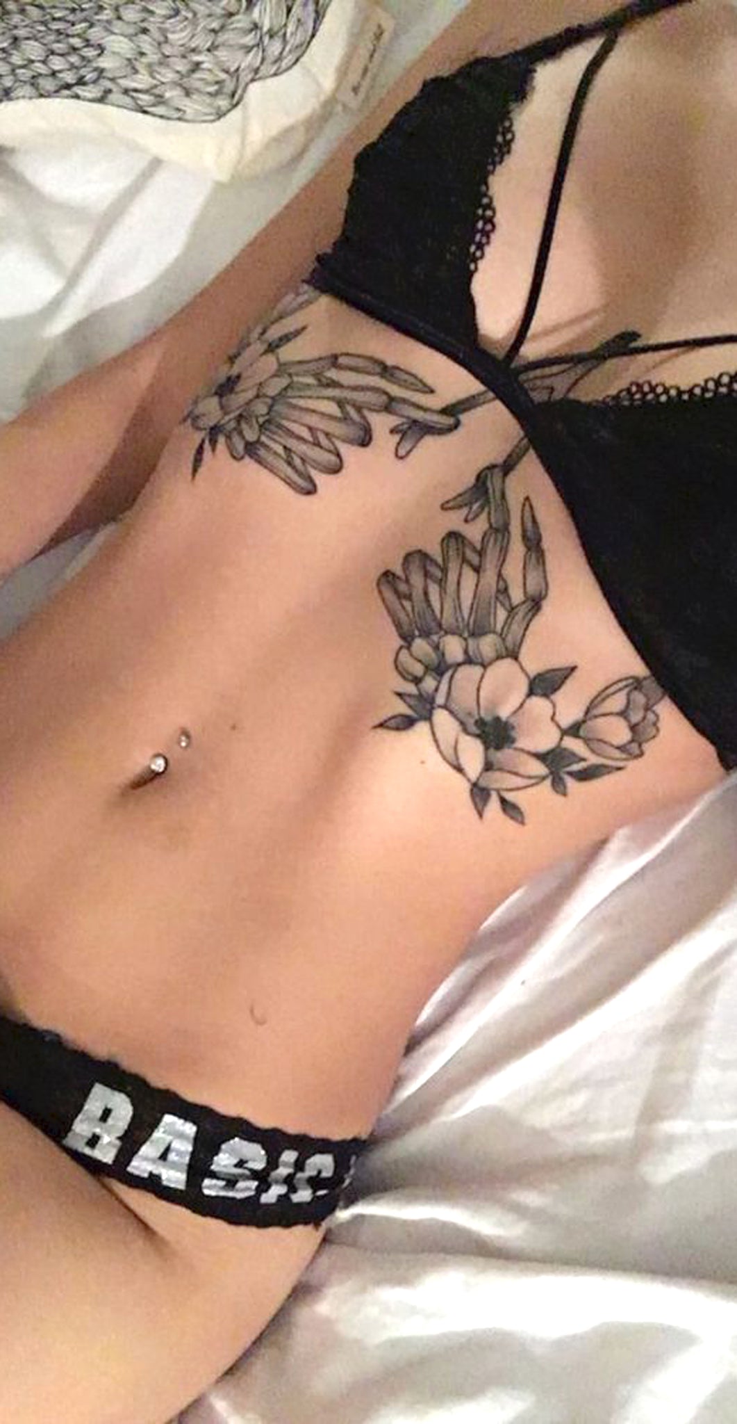 rib cage tattoos for women