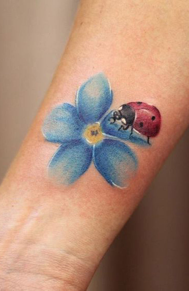 Cute Watercolor Blue Floral Flower Wrist Tattoo Ideas for Women -  ideas de tatuaje de antebrazo flor azul - www.MyBodiArt.com