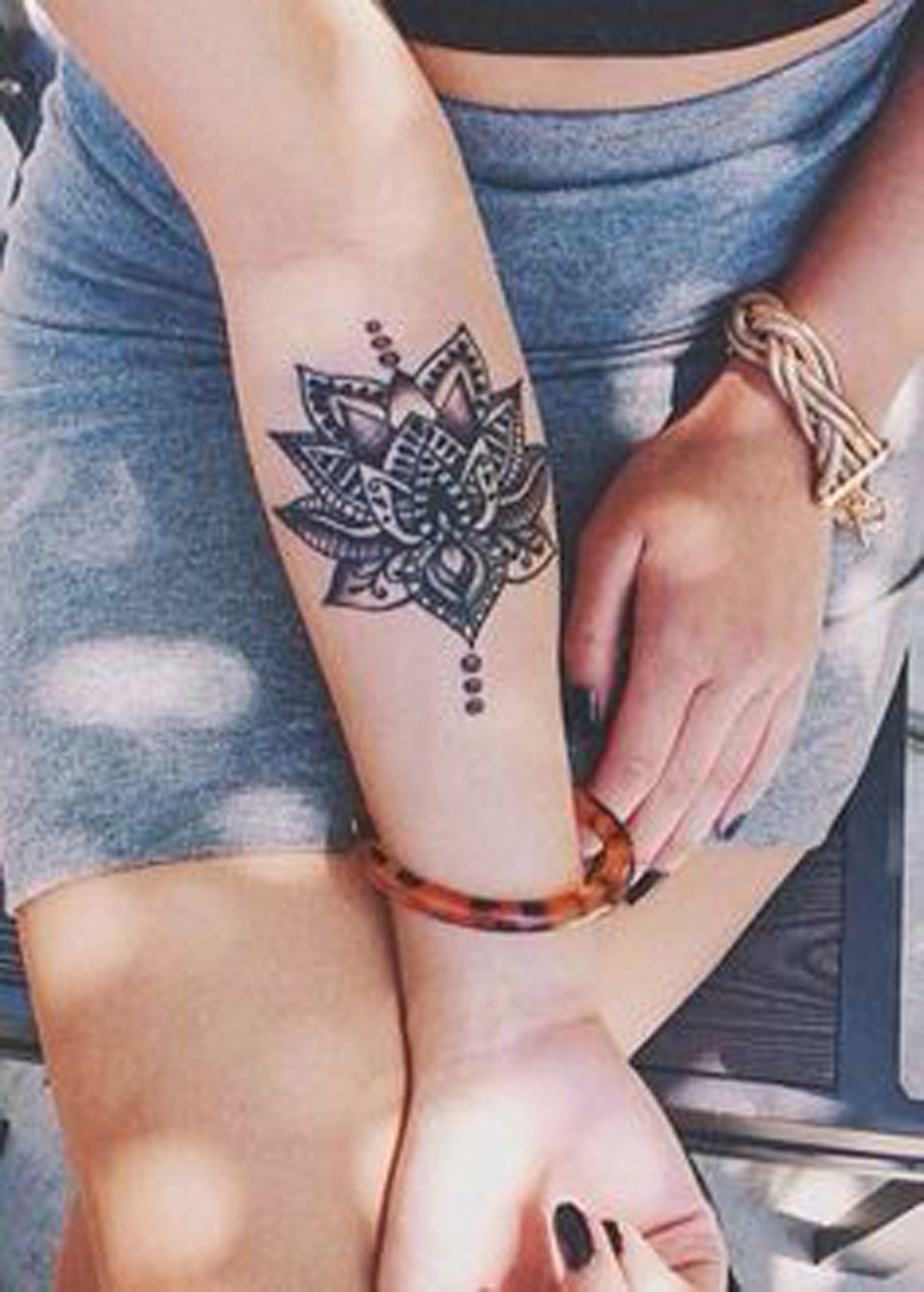 Beautiful Lotus Wrist Tattoo Ideas for Women at MyBodiArt.com 