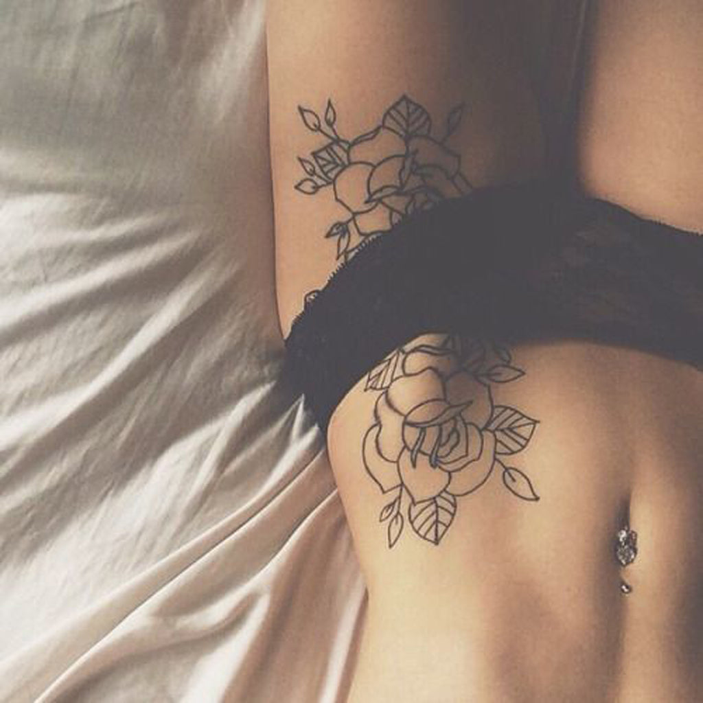 Sexiest Women's Tattoos - Black Floral Hip Tattoo - MyBodiArt.com