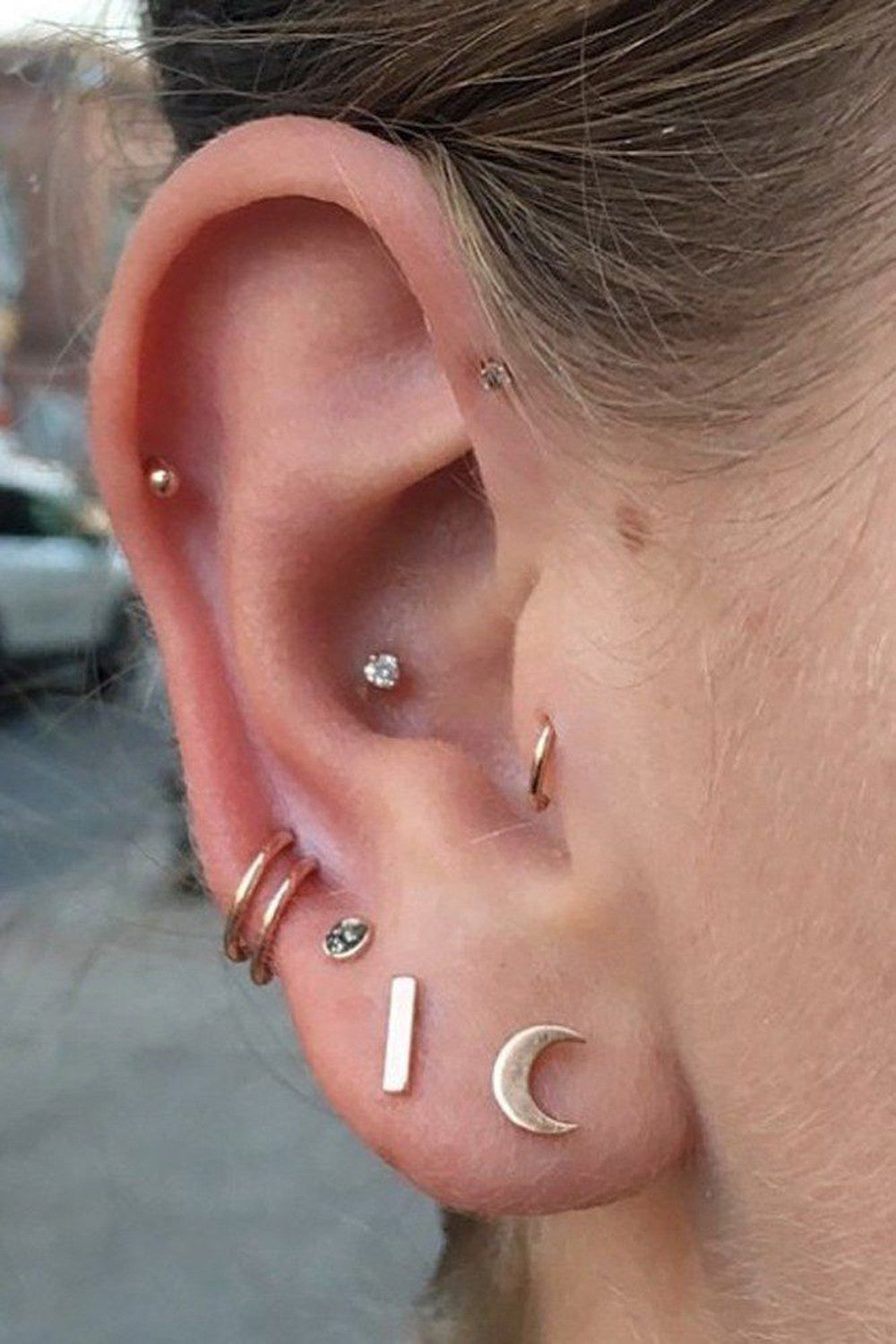 Simple Cute Multiple Ear Piercing Ideas at MyBodiArt.com - Conch Cartilage Pinna Forward Helix Stud Auricle Ring Hoop in 16G Gold Moon Earrings