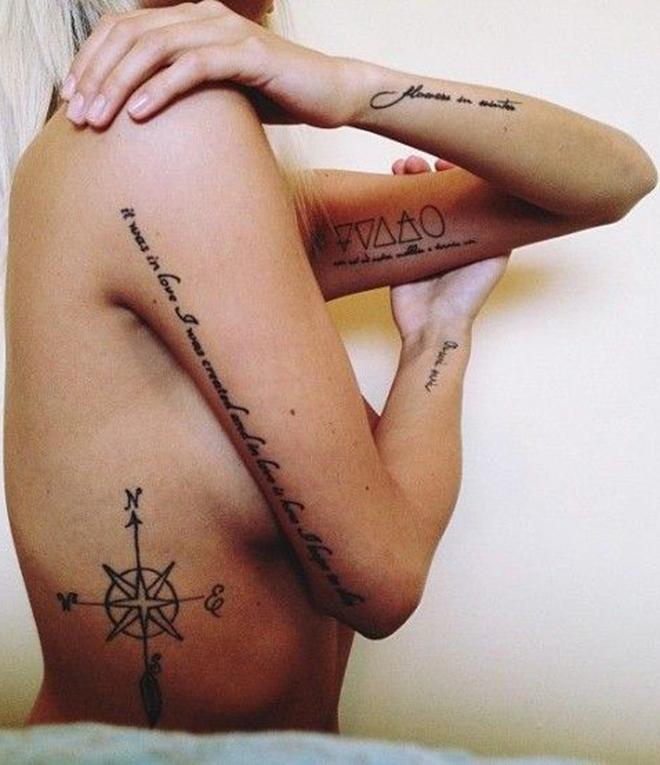 Arrow Compass Tattoo Ideas with Quote - Rib Tats for Women - MyBodiArt.com