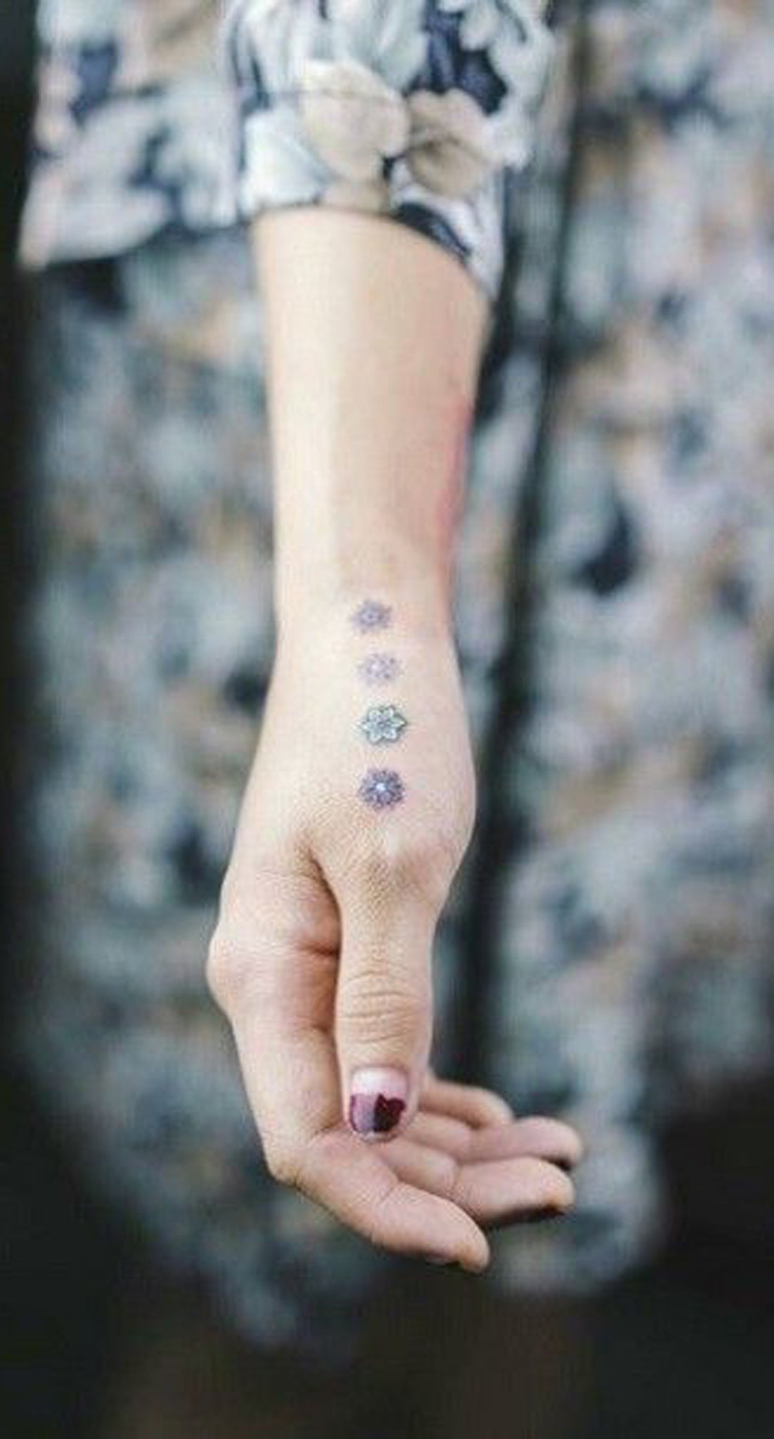 Tiny Minimalistic Floral Flower Hand Tattoo Ideas at MyBodiArt.com