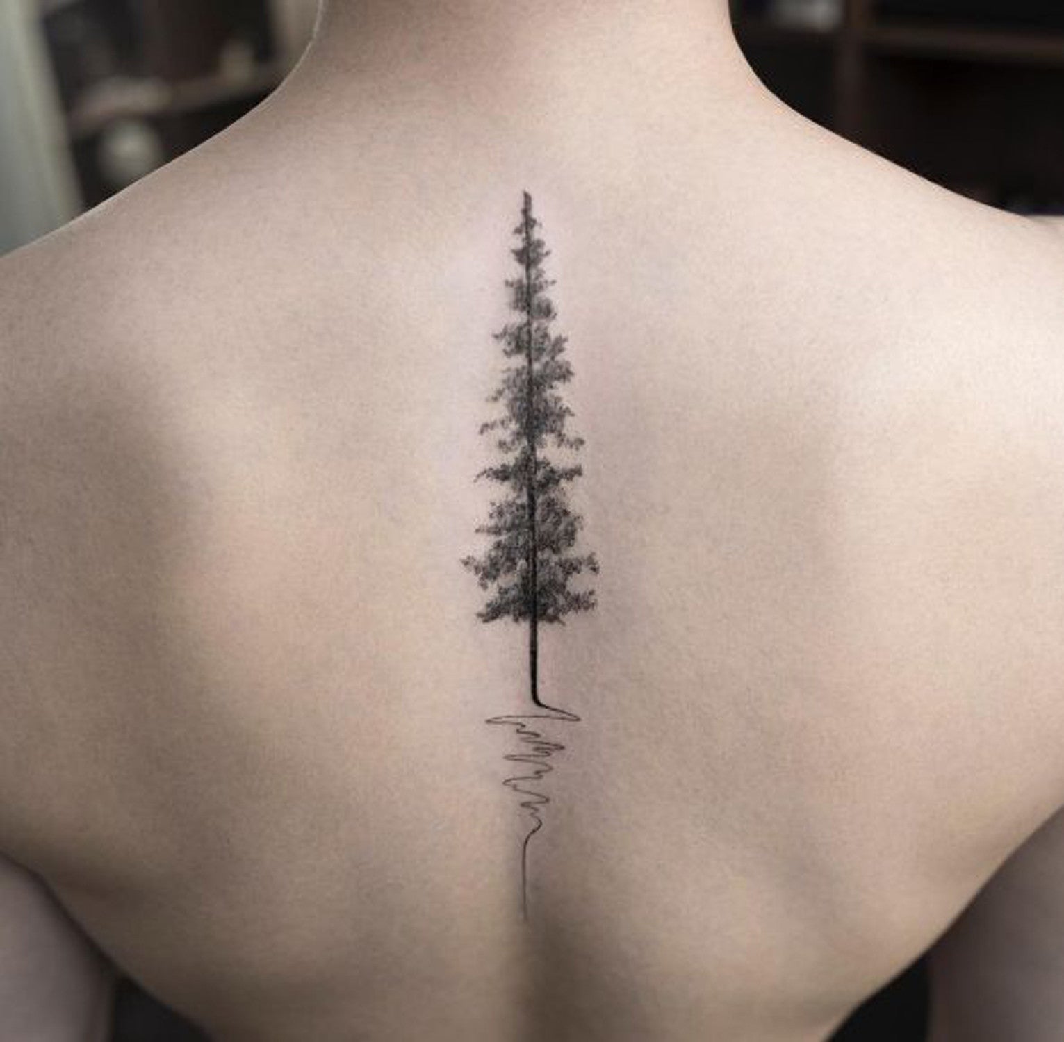 Beautiful Nature Pine Evergreen Tree Spine Tattoo Ideas for Women at MyBodiArt.com