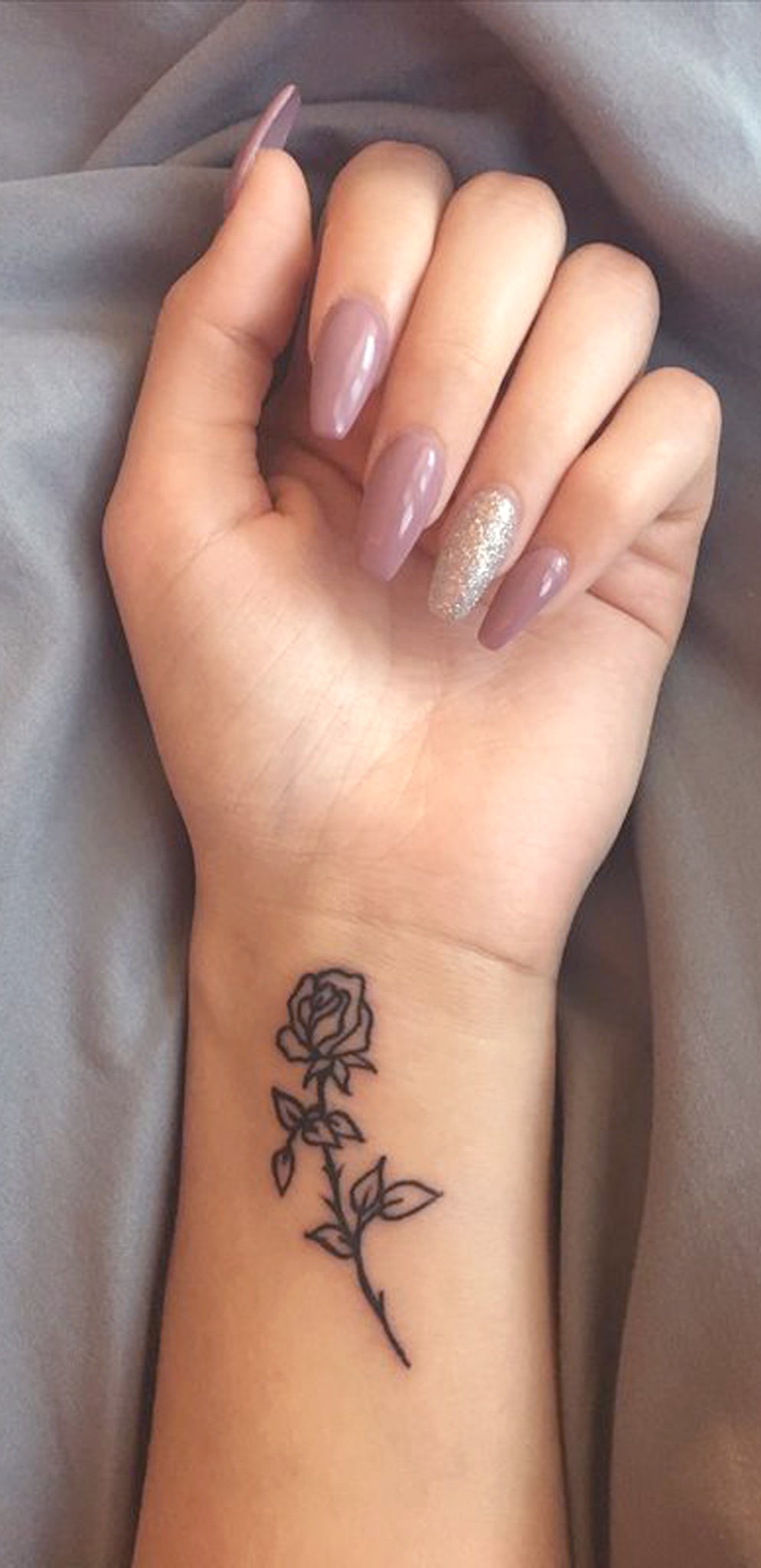 Small Rose Wrist Tattoo Ideas for Women - Minimal Flower Arm Tatouage - Ideas Del Tatuaje Inked - Coffin Nail Ideas Art - www.MyBodiArt.com