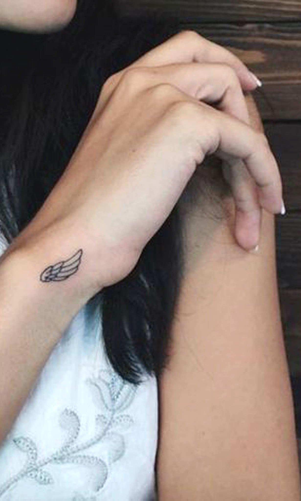 Simple & Small Wrist Tattoo Ideas - Hidden Angel Wing Symbol Arm Tatouage with Meaning - Ideas Del Tatuaje - www.MyBodiArt.com