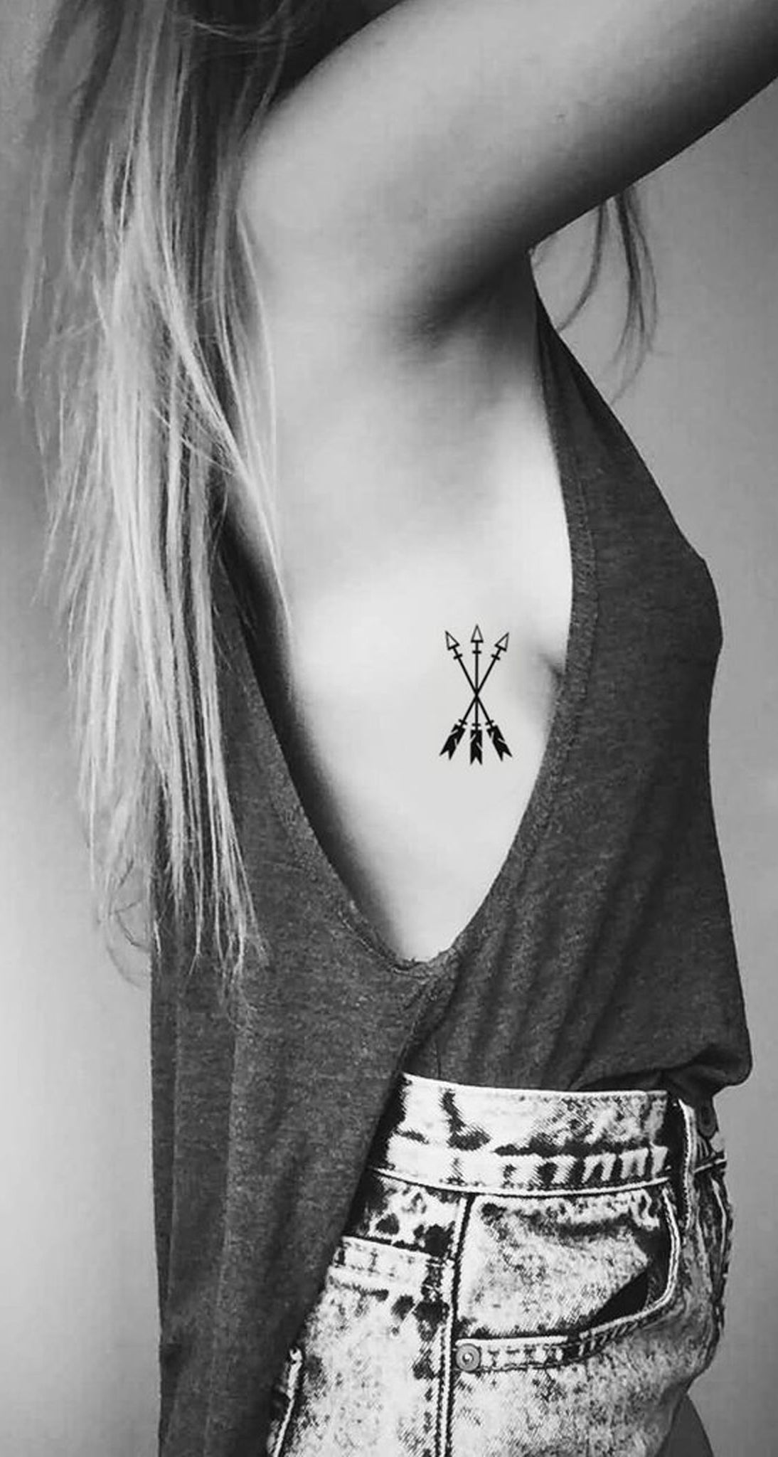 Meaningful Small Arrow Rib Tattoo Ideas for Women -  ideas tribales del tatuaje para chicas - www.MyBodiArt.com 