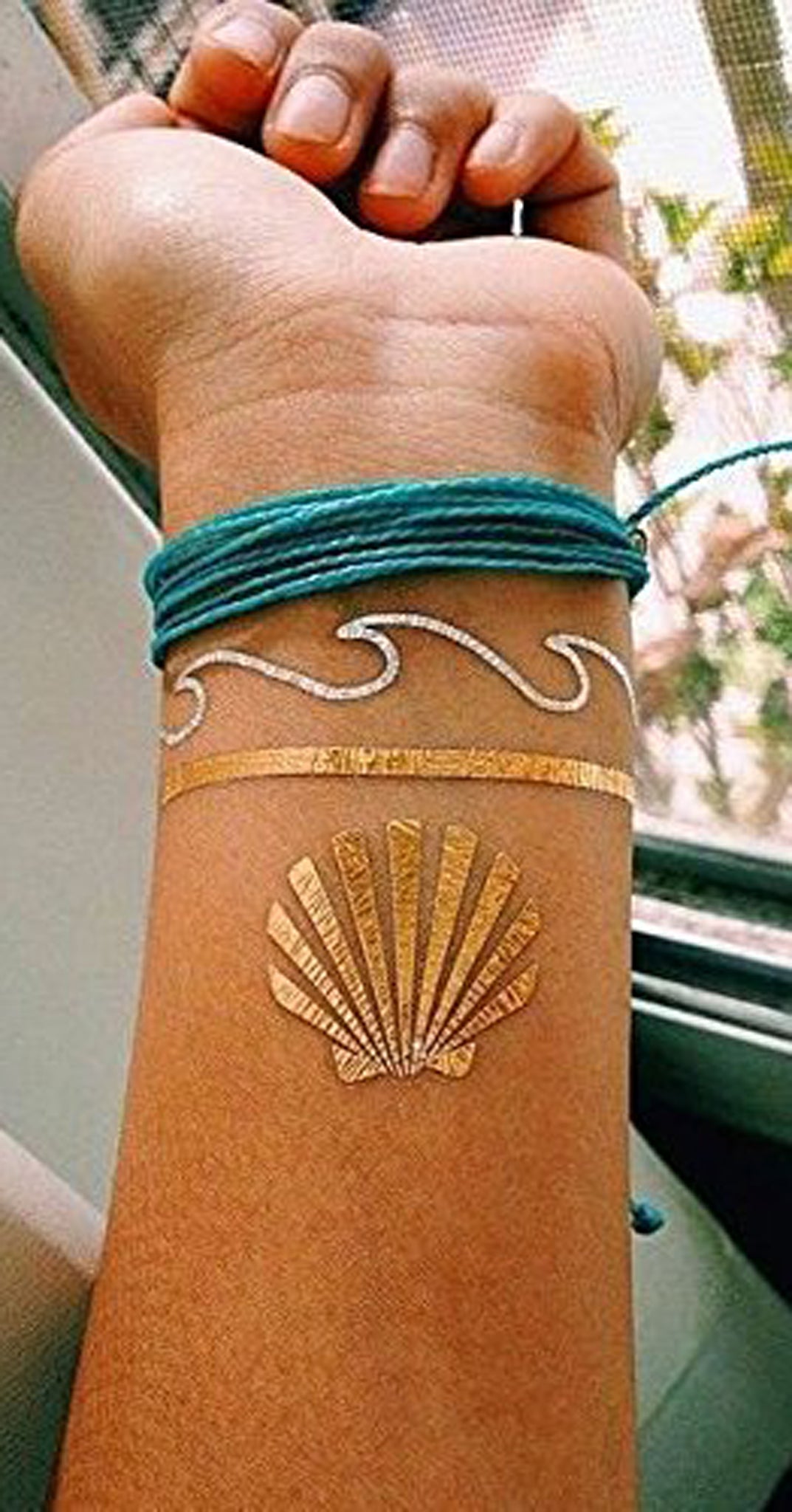 Seashell Tattoo Ideas for Women - Gold Metallic Sea Beach Flash Wrist Tat -  MyBodiArt.com
