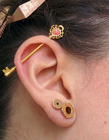 Gold Industrial Piercing Jewelry with Red Opal at MyBodiArt