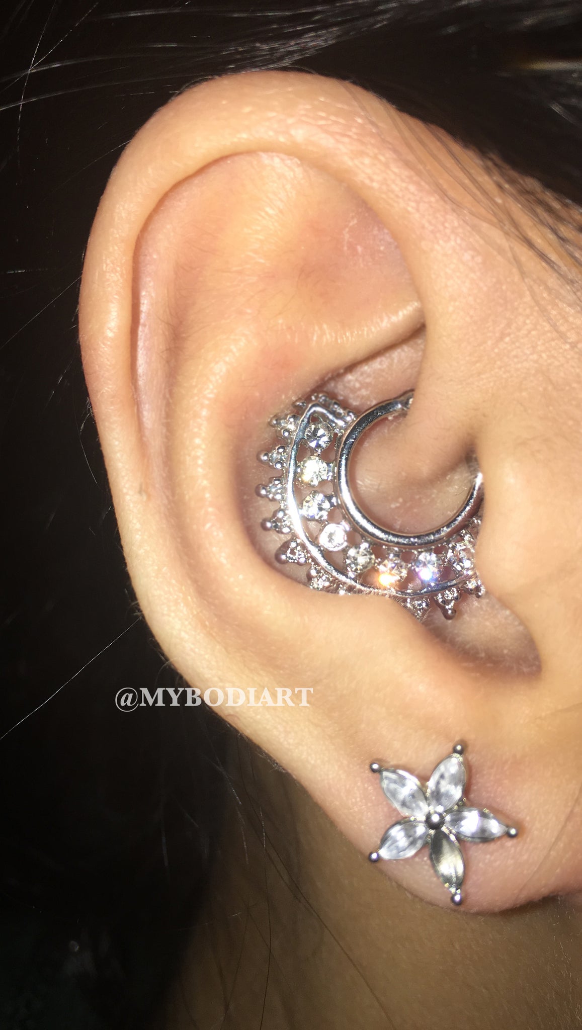 Unique Ear Piercing Ideas Cartilage for Teens Silver Daith Ring Crystal Flower Earring Stud - www.MyBodiArt.com