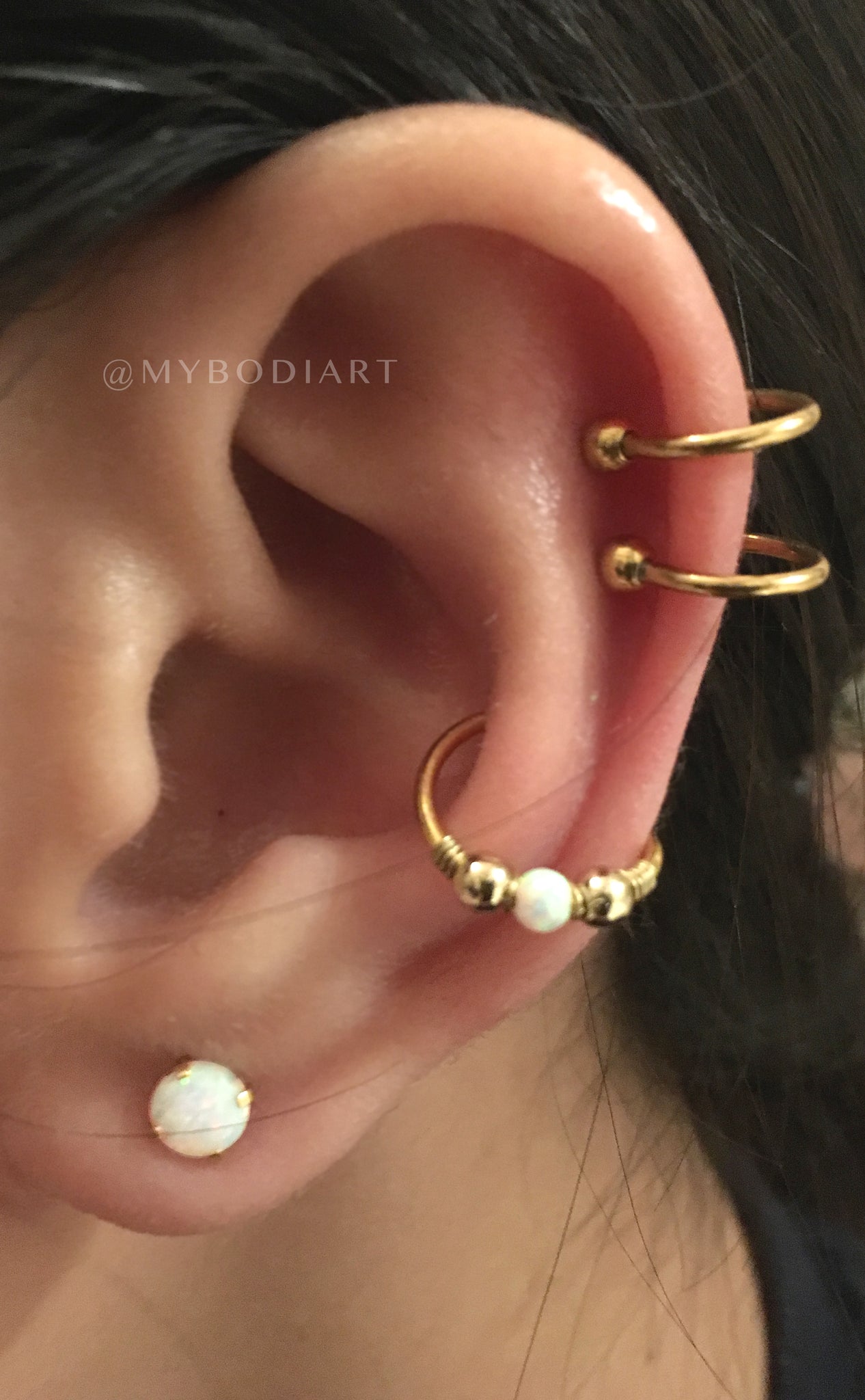 Double Cartilage Ear Piercing Ideas for Girls - Opal Conch Earring Ring - Ear Lobe Studs - www.MyBodiArt.com 