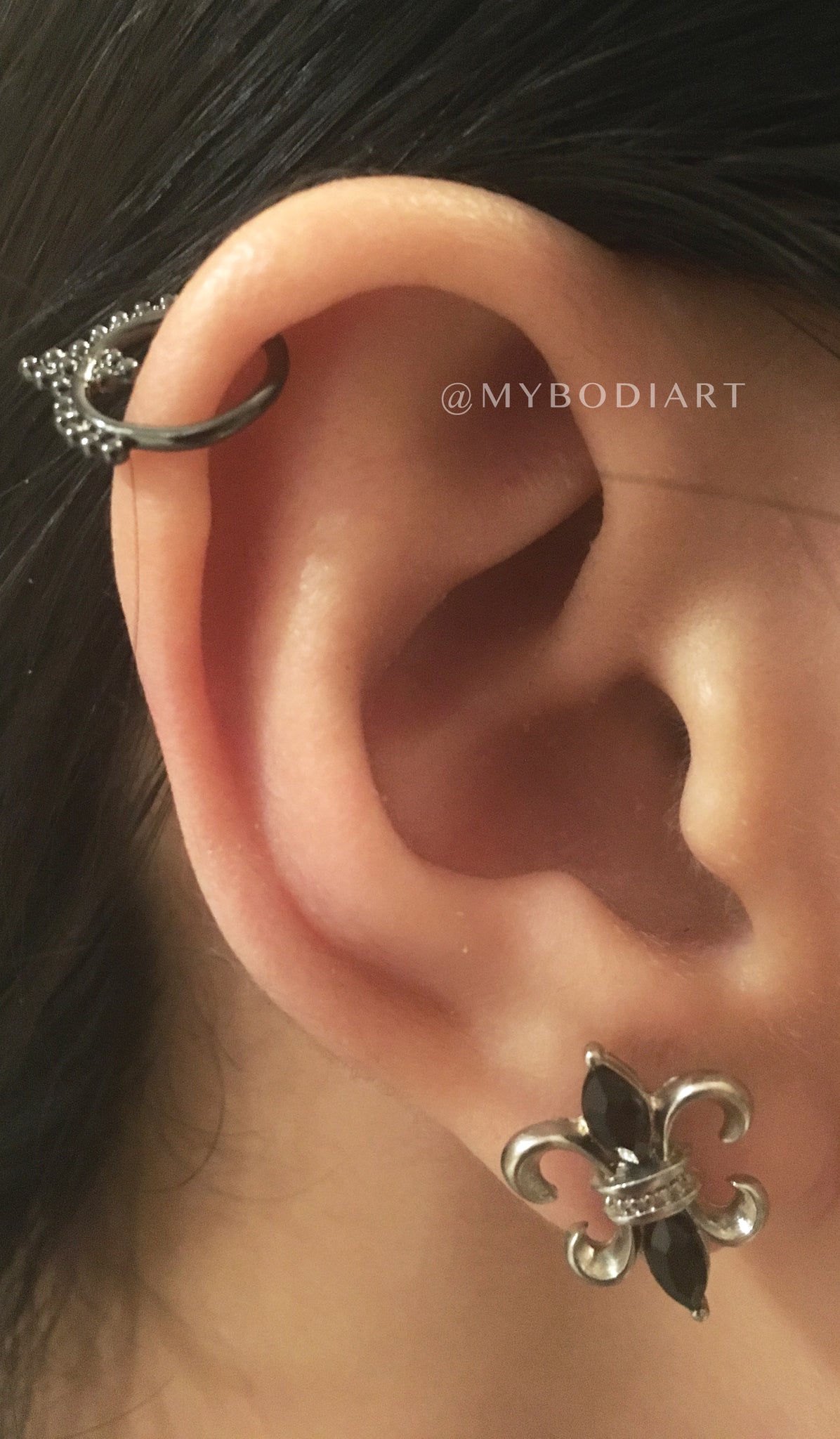 Tribal Boho Ear Piercing Ideas for Girls - Black Cartilage Helix Ring Hoop - fur elise symbol stud earring - www.MyBodiArt.com