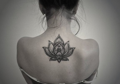 Tribal Lotus Back Tattoo Ideas at MyBodiArt