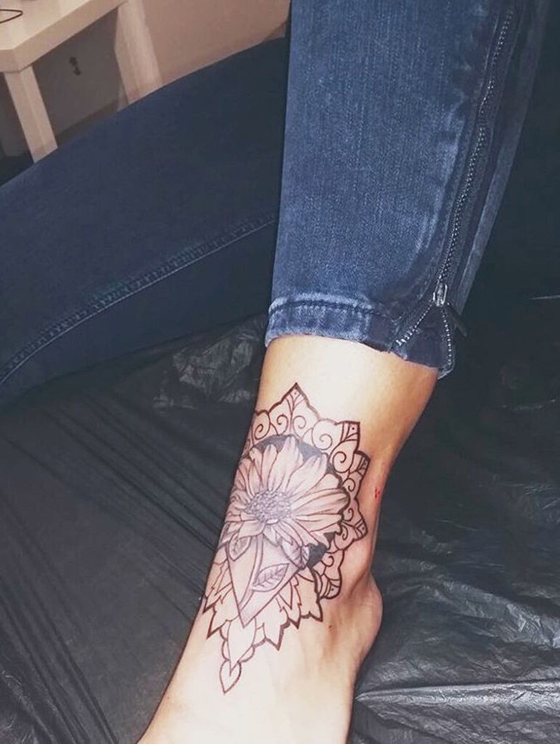 Small Black and White Geometric Floral Sunflower Mandala Ankle Leg Foot Tattoo Ideas for Women at MyBodiArt.com 