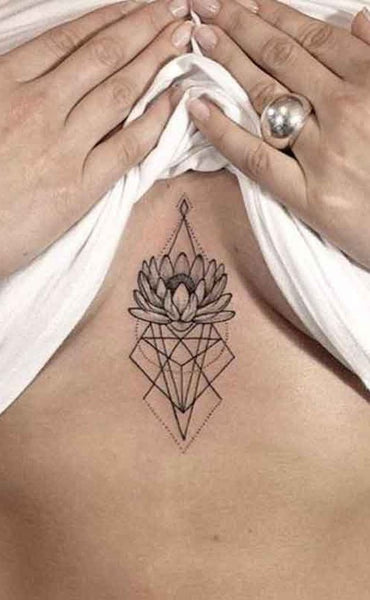 Tribal Lotus Sternum Tattoo Ideas for Women Boho Geometric Linework Black Triangle Diamond Tat - www.MyBodiArt.com #tattoos