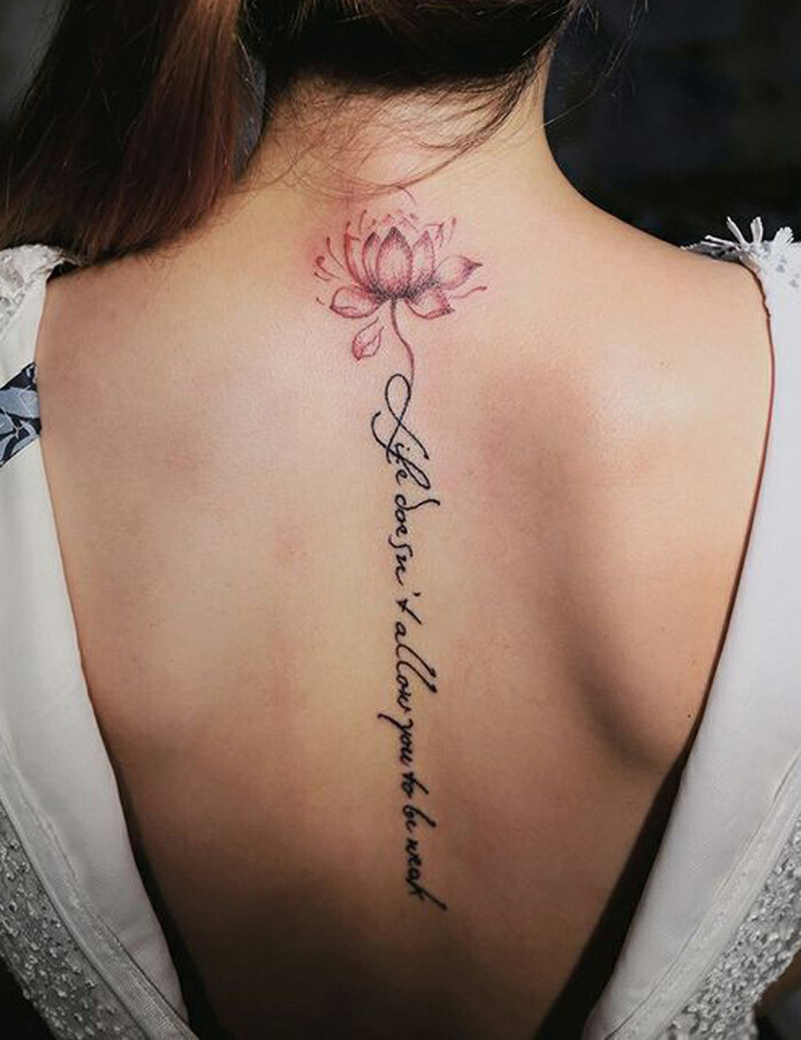 Watercolor Lotus Flower Vertical Script Spine Tattoo Placement for Women - Back Tat at MyBodiArt.com 