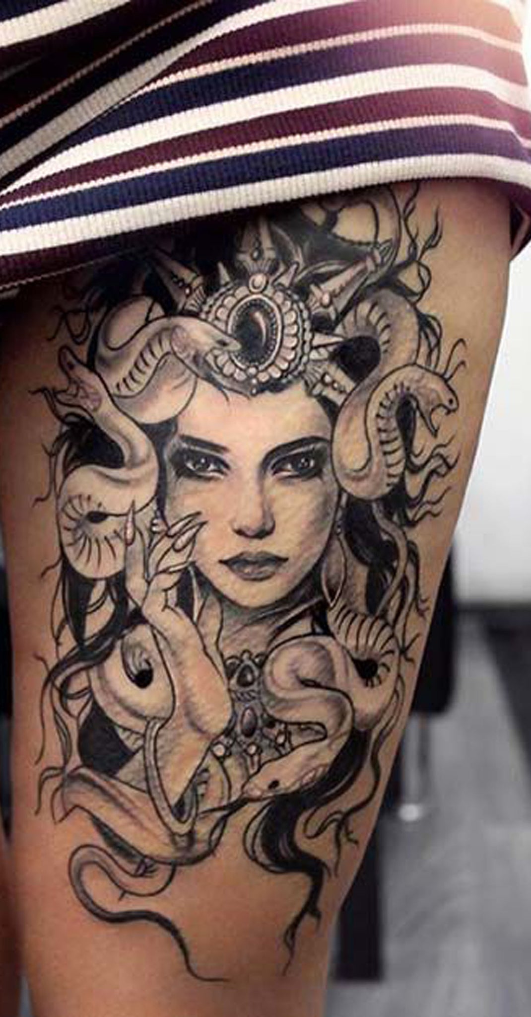 Cool Unique Thigh Tattoo Ideas for Women - Medusa Head Portrait Leg Tat - www.MyBodiArt.com #tattoo